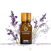 Small amber essential oil bottle with gold cap amid lavender flowers for scars of acne treatment