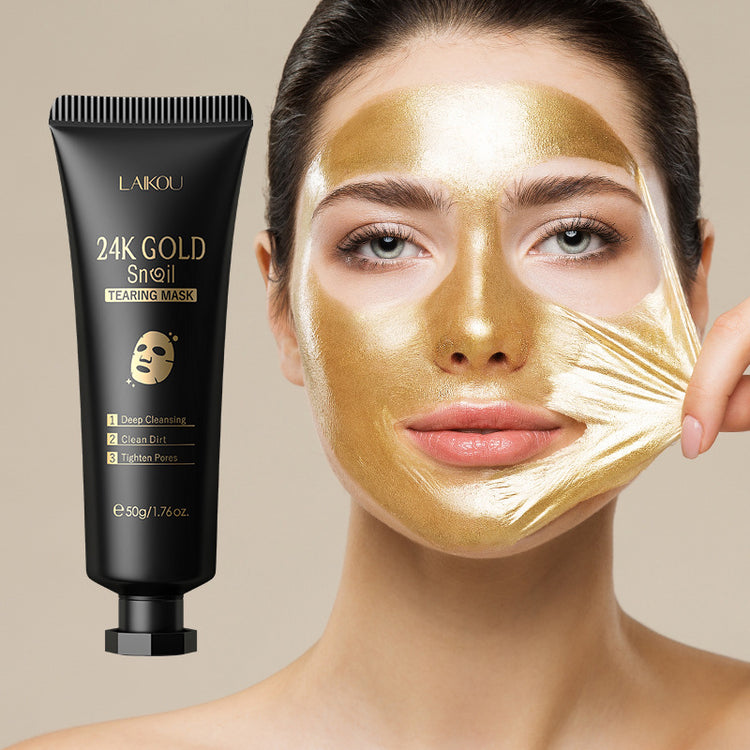 Organic and functional face mask 24K gold snail peeling mask being removed from woman&