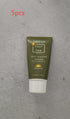 Tube of self-tanning lotion with fast tan bronze labeled organic and functional face mask