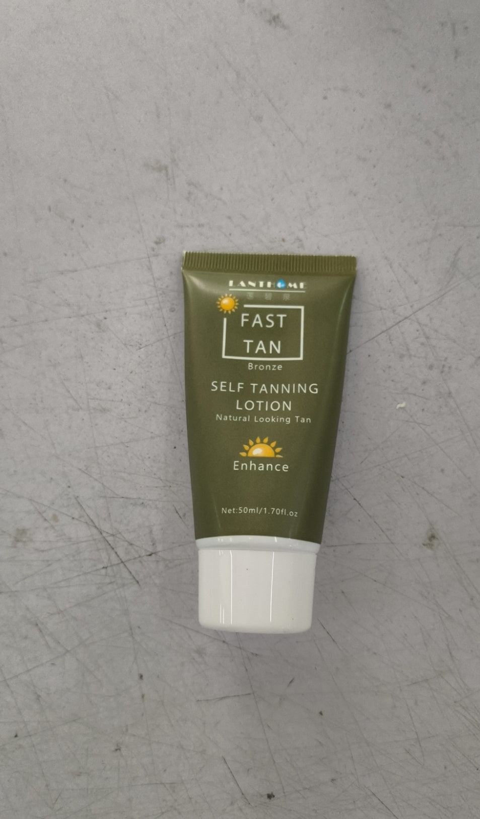 Tube of Fast Tan Self Tanning Lotion for a natural sun-kissed look with organic and functional face mask