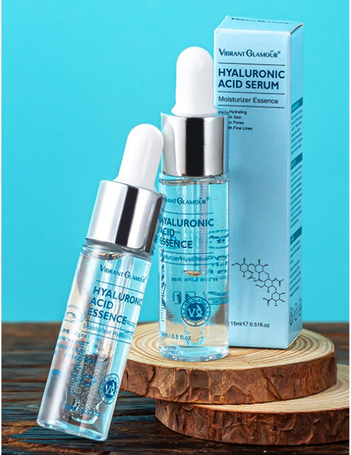 Hyaluronic acid serum bottle and box displayed on wooden slices highlighting organic and functional face mask benefits